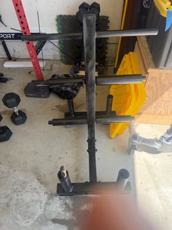 Olympic weightlifting plate and barbell holder