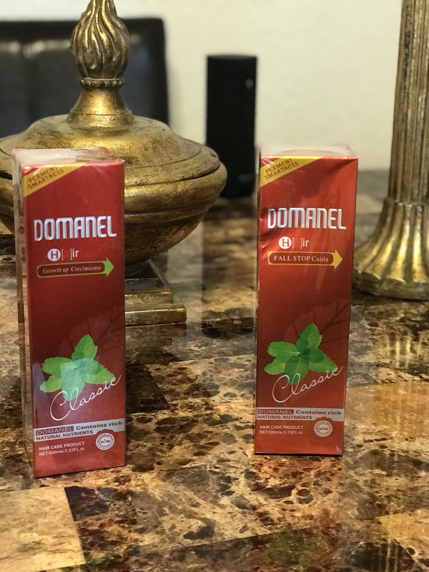 Domanel hair product, growth up and fall stop