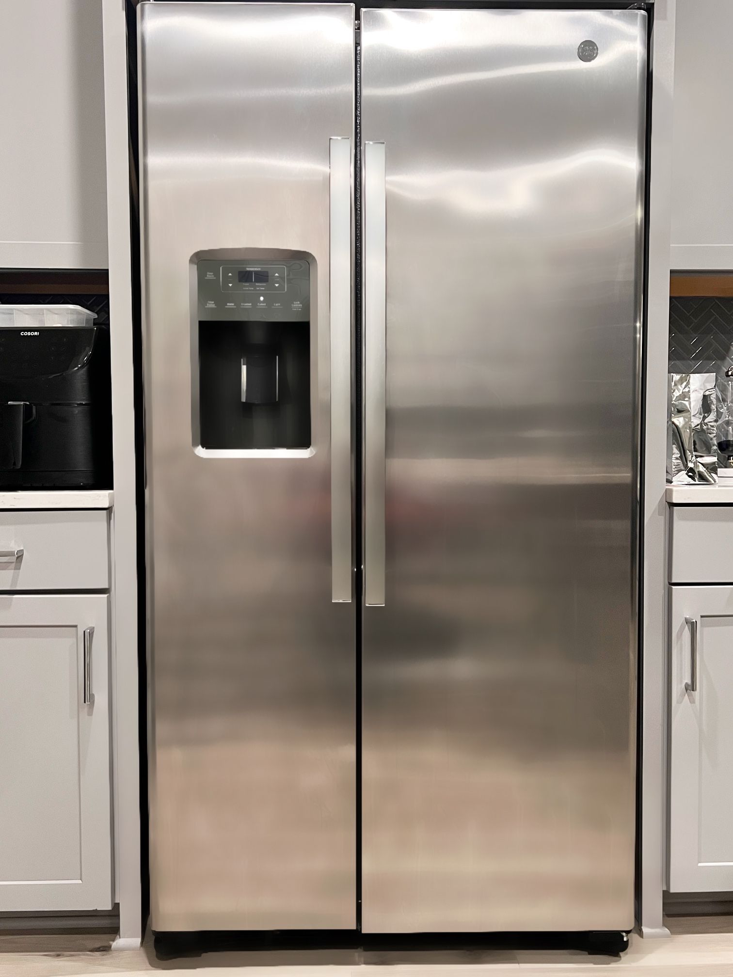 Stainless Steel GE Side-by-Side Refrigerator – Excellent Condition