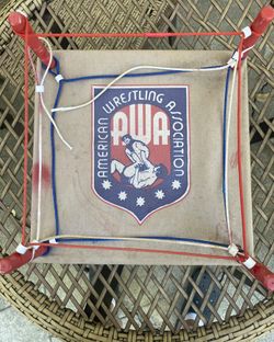 Vintage 1985 American Wrestling Association (AWA) wrestling ring (price $40) part of rope broken