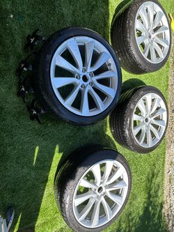 Used Tesla model 3 “19 sport wheels