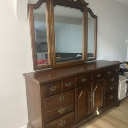 Brown Wood Dresser With Matching Drawers 