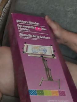 adjustable, hands-free floor-standing scroll frame designed for needlework.