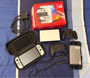 Nintendo Switch OLED White Bundle + Pro Controller – Excellent Condition