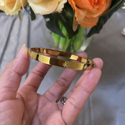 Gold Star-Embellished Bangle Bracelet