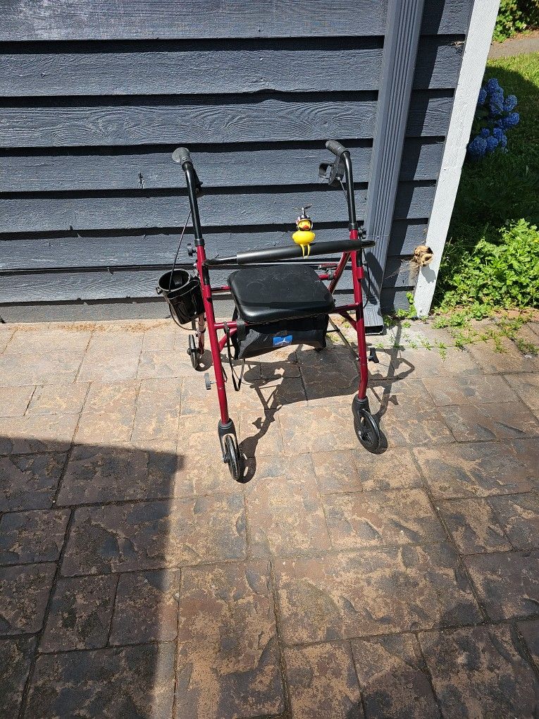 Rolling Walker With Seat, Cup Holder, And Speed Duck