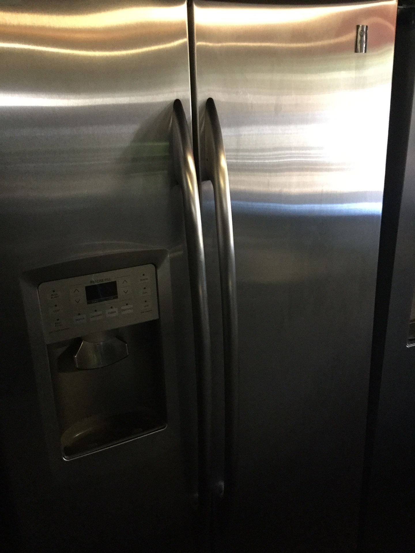 Ge stainless kitchen set/ refrigerator, dishwasher, microwave, and range