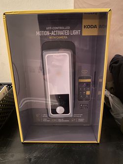 koda security camera with motion-activated floodlight