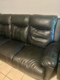Black reclining sofa and loveseat set