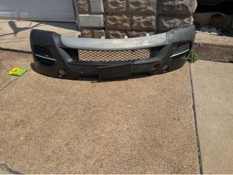 2010 X5 front strut assembly $300 and front bumper cover $150