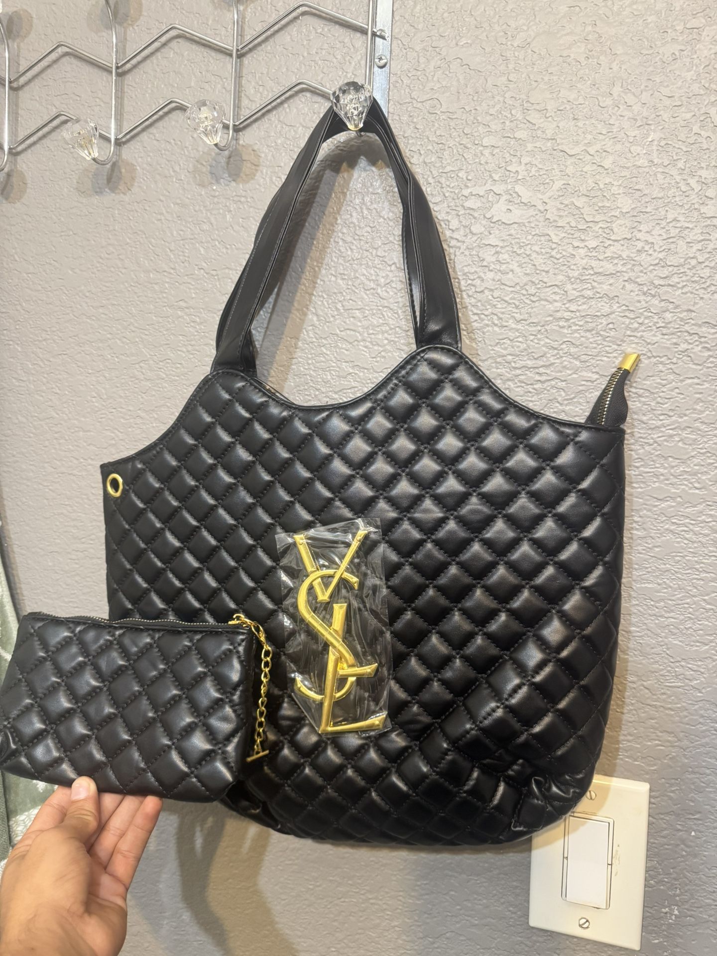 Selling 2 stylish black quilted YSL bags