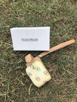 Dooney and Bourke cream and multi-color cellphones case wristlets