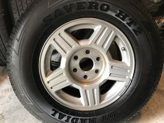 Chevy or GM tires and Rims mounted and balanced with wheel caps and lugs, excellent shape,for 4 wheel drives