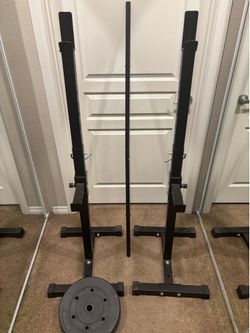 Squat/Curl rack.  Weight Bar, and 100lbs in weights.