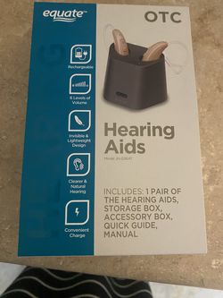New in box never opened hearing aids