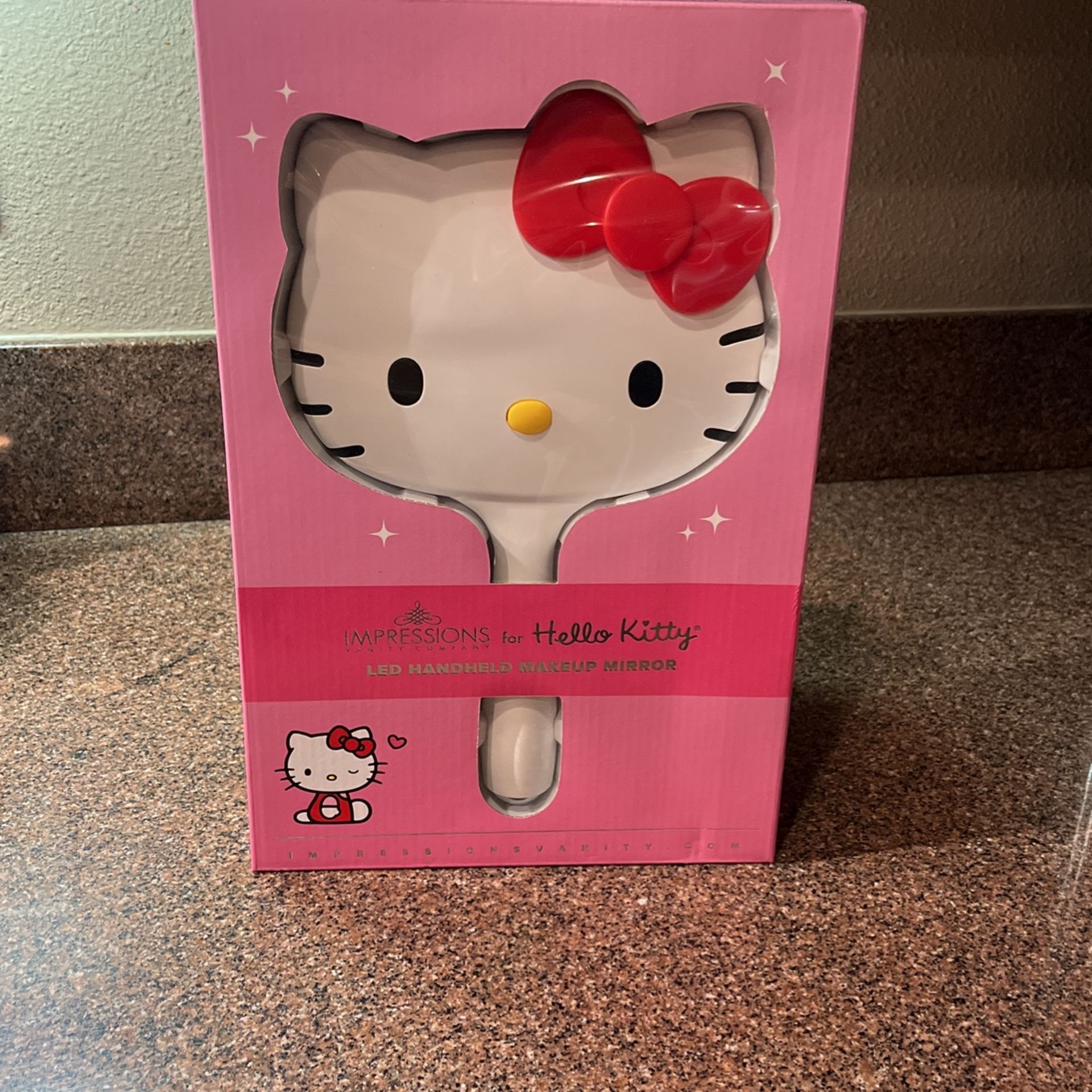 Hello Kitty Impressions LED Handheld Makeup Mirror 