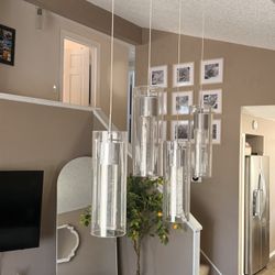 Mium 29.5 in. 4-Light Modern Style Iron/Crystal/Glass Integrated LED Linear Pendant Light, Chrome