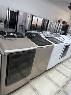 Samsung top load washer and electric dryer set