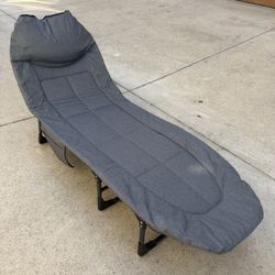 New reclining folding cot, or spare bed, with built-in pillow and padding 71” x 24”