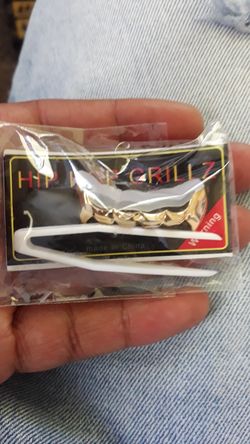 Gold fang bottom grill