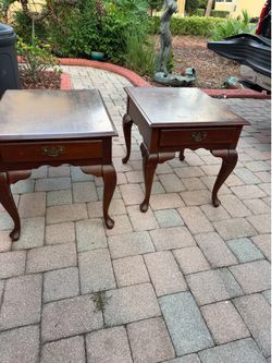 Two wood side tables