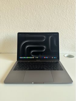 MacBook Pro 15 inch with Touch Bar Intel core i5 16GB RAM 256GB SSD and paid apps or best offer