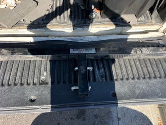 Extend a truck bed extender