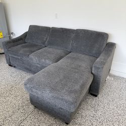  Fabric Sleeper Sofa with Chaise — Gray- Excellent Condition. (Retail $1200 at Сostco)