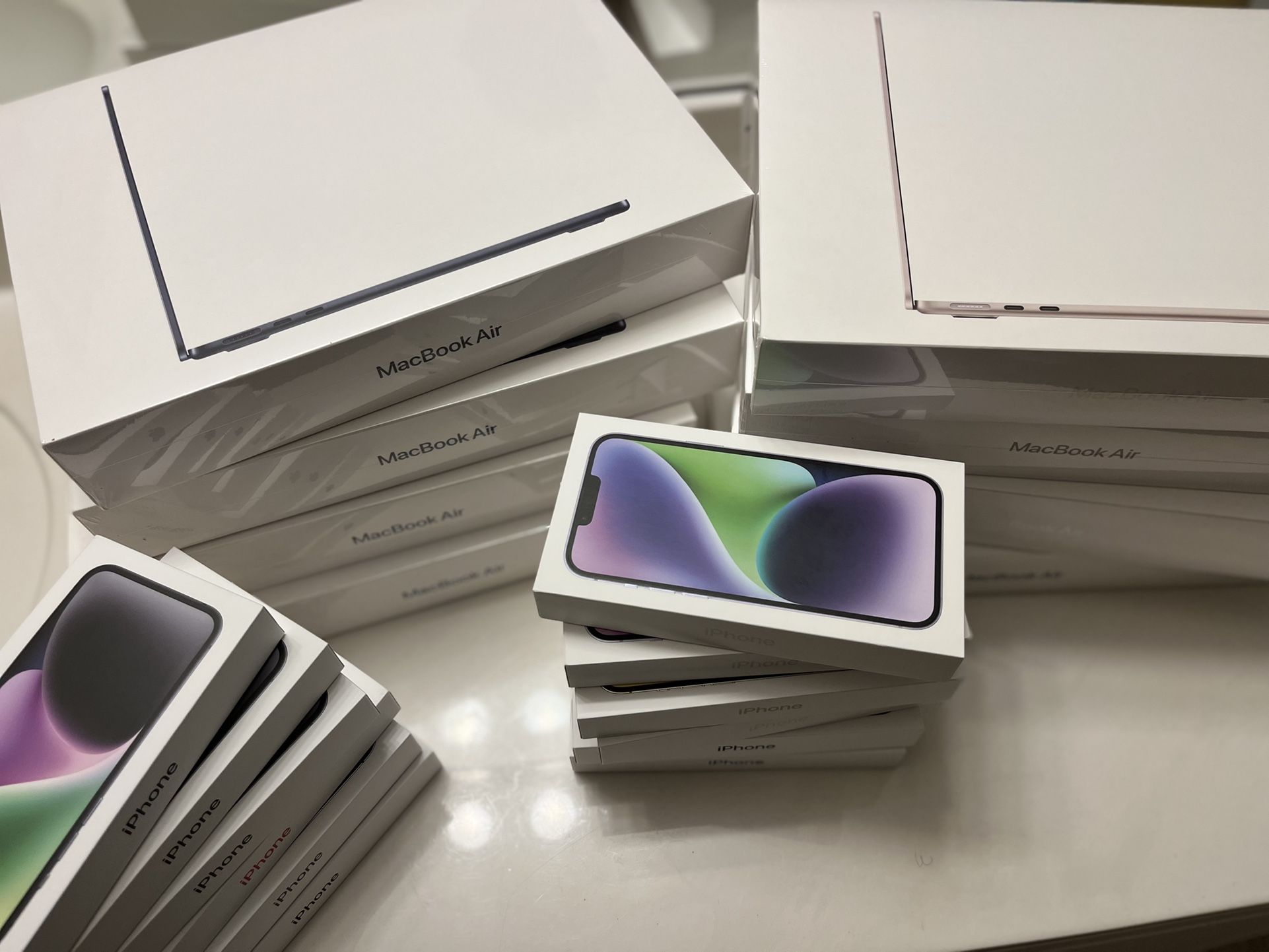 Apple iPhone 14s and MacBook Airs