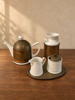Vintage Porcelain Tea Set with Metal Cozies