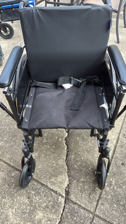 Black Manual Wheelchair with Cushion