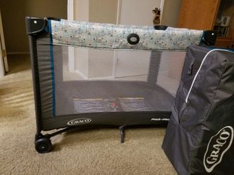 Pack and play with newborn napper