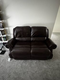 Real brown leather two seat recliner sofa