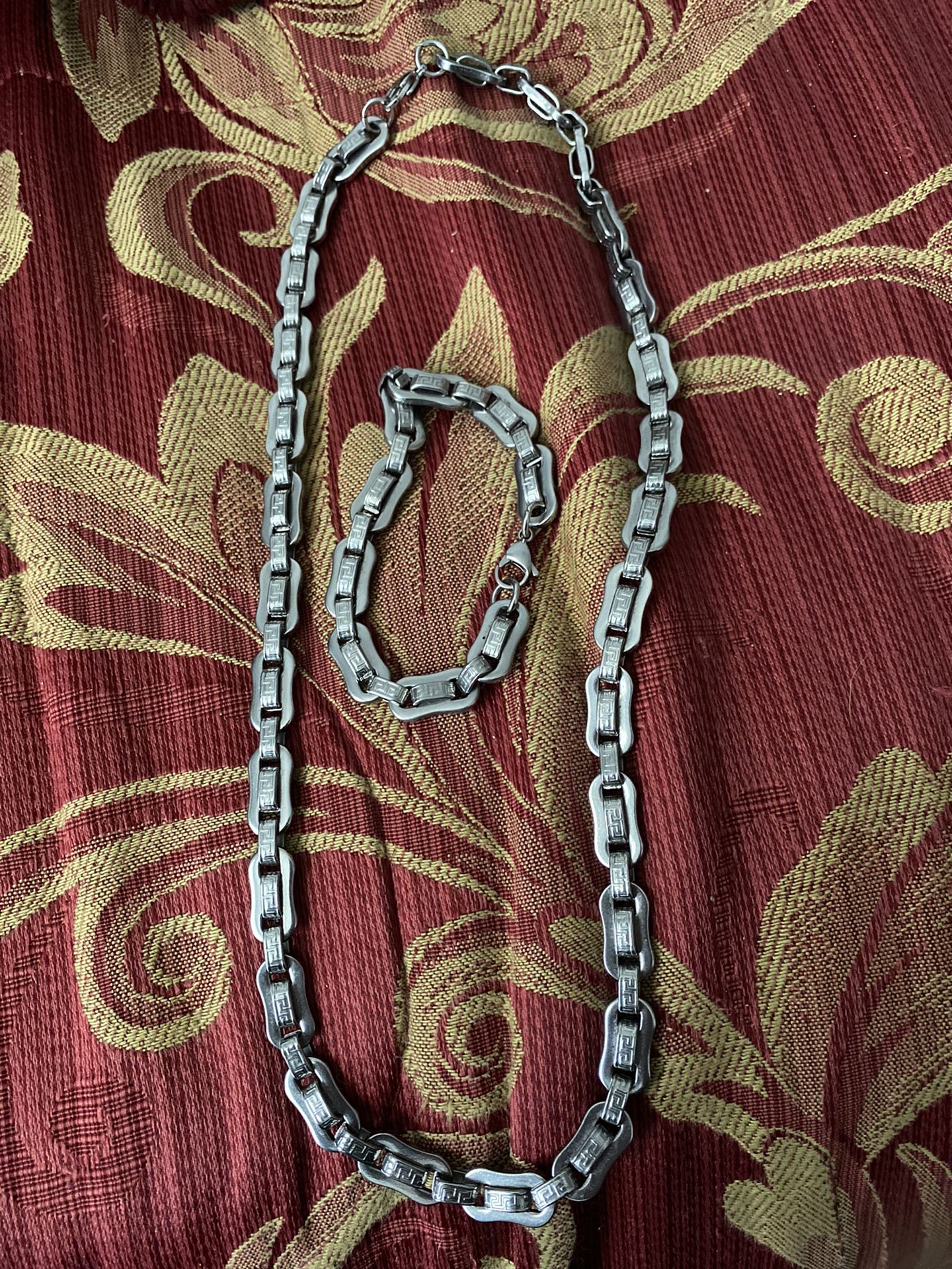 stainless steel necklace and bracelet in perfect condition