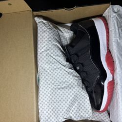 Jordan 11 Low Retro " Bred "