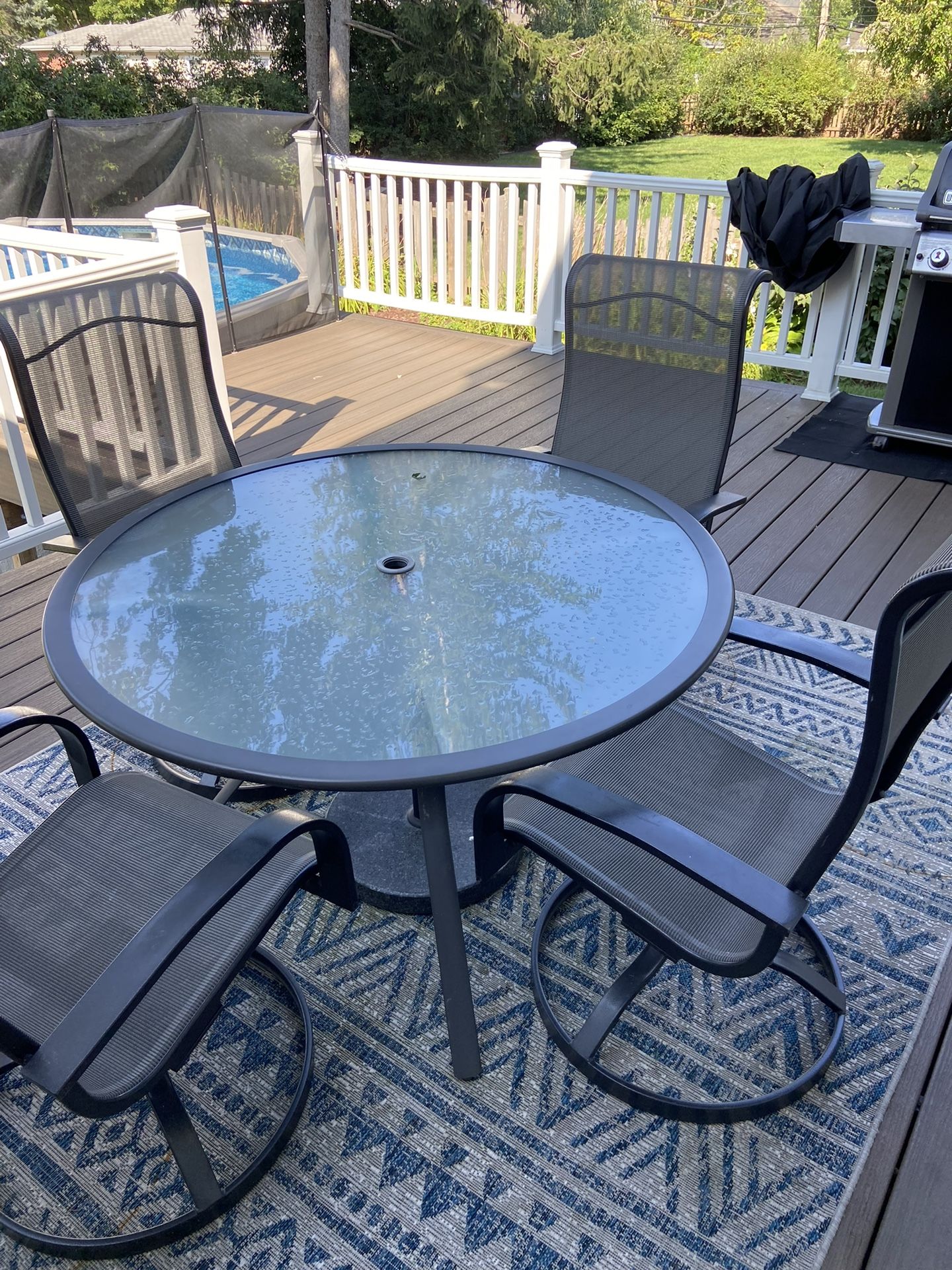 Patio Set - 4 Chairs And Glass Table - $125