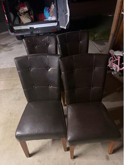 4 Brown leather chairs