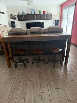Solid Wood Pub Table with 3 Adjustable Bar Stools – Excellent Condition
