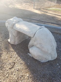 Concrete benches and sculptures.