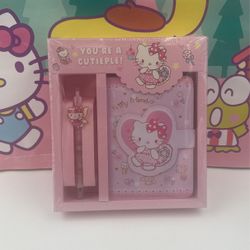 hello kitty note pad with pen