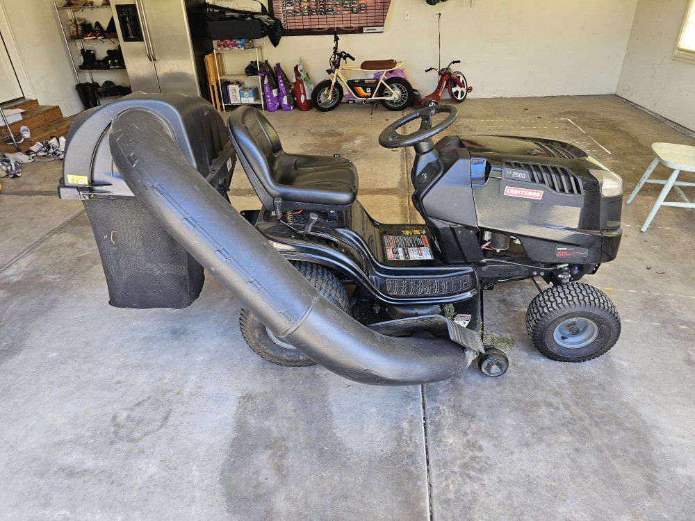 Riding Mower With Aerator And Dethatcher
