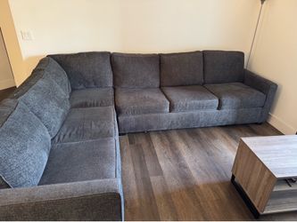Section Couch 125”W x 97”D x 38”H