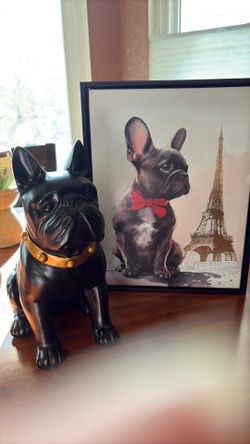 Dog statue of a dog and picture