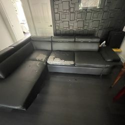 Black leather Couch With Retractable Extra Section