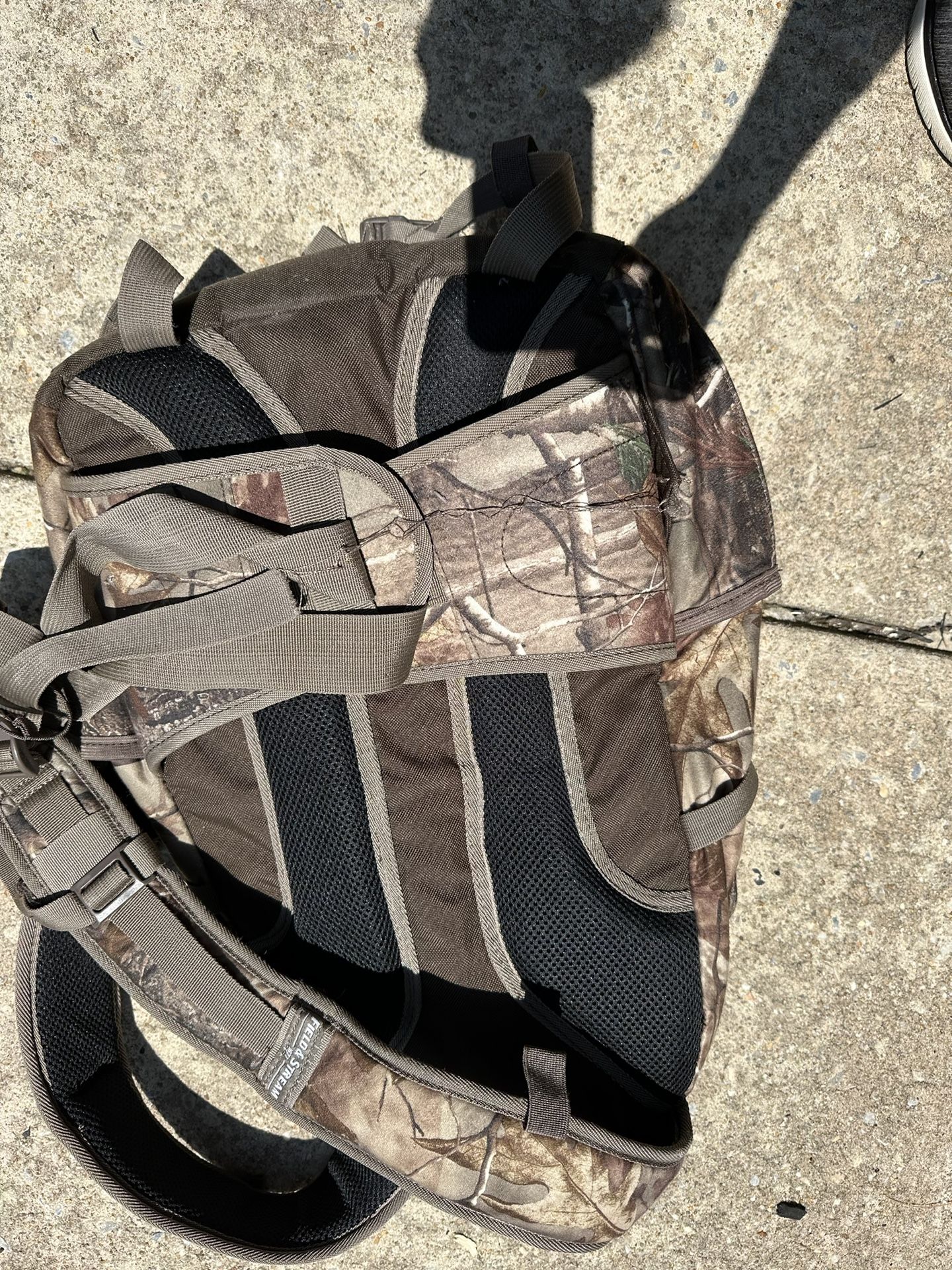 Army camouflage backpack And Black Duffel Bag