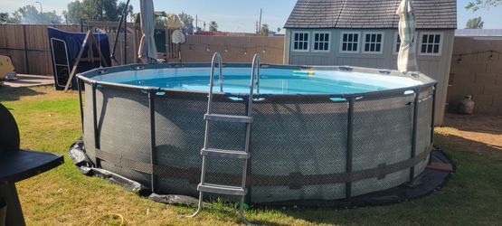 16 FT COLEMAN POOL W/ POOL COVER AND LADDER