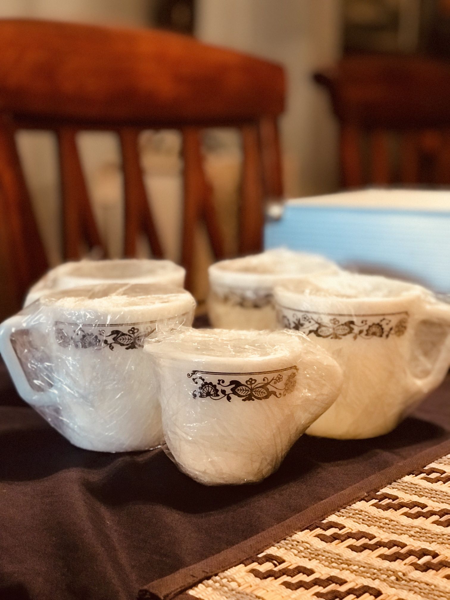 4 Vintage Pyrex Old Town Blue Mugs and Creamer. They are All Wrapped In Shrink Wrap