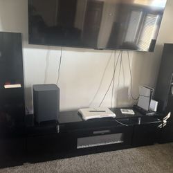 Selling our entertainment center As Well as both couches!!