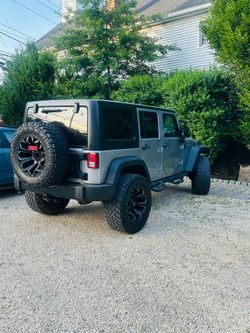 2017 Jeep Wrangler/ willys unlimited 4D grey
