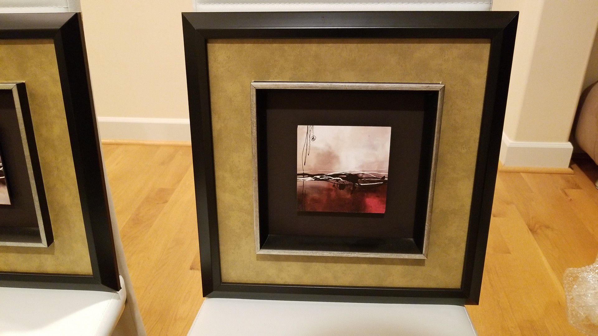 Two abstract framed wall art pictures from Bad Bath and Beyond